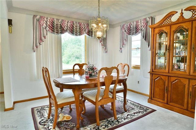 3787 Helsey Fusselman Rd, Southington, OH 44470 - dining area featuring light colored carpet and a chandelier