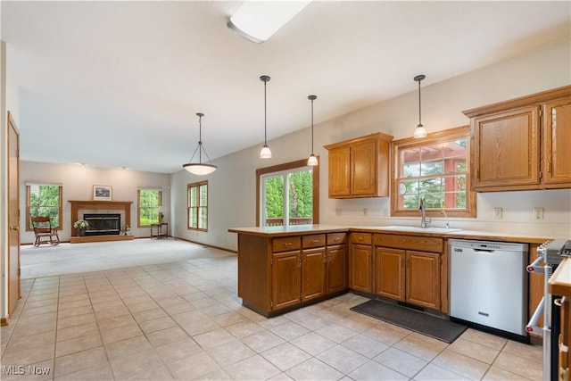 3342 Ramsgate St NW, North Canton, OH 44720 - kitchen featuring stainless steel dishwasher, a peninsula, healthy amount of natural light, and light countertops