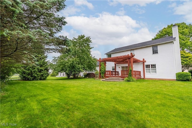 3342 Ramsgate St NW, North Canton, OH 44720 - rear view of house with a pergola, a chimney, a lawn, and a deck