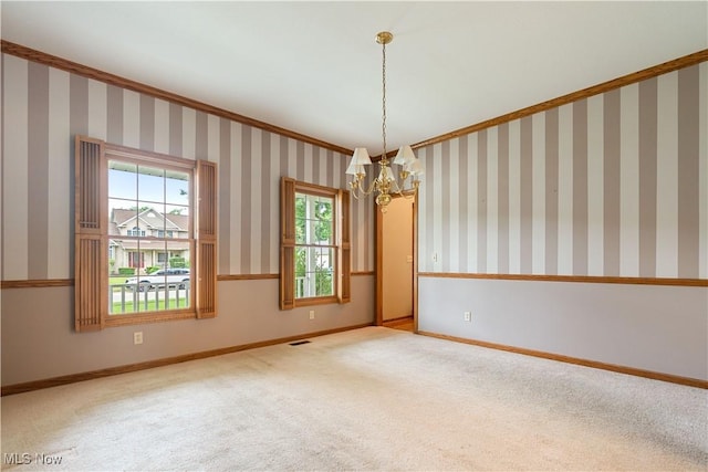 3342 Ramsgate St NW, North Canton, OH 44720 - carpeted empty room featuring a chandelier and crown molding
