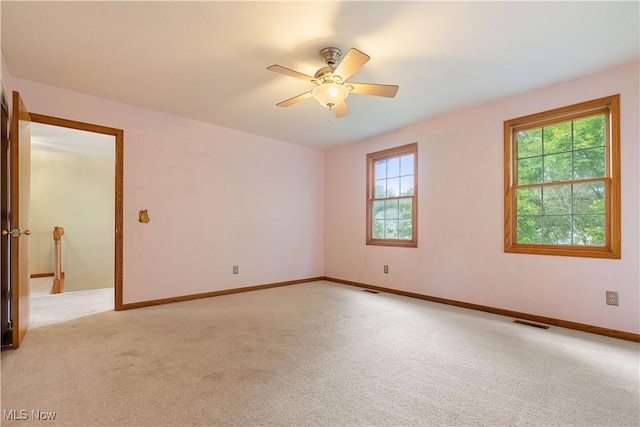 3342 Ramsgate St NW, North Canton, OH 44720 - unfurnished room with ceiling fan and light colored carpet