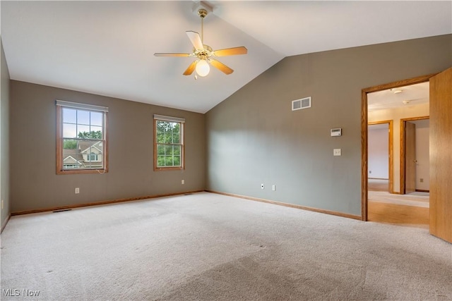 3342 Ramsgate St NW, North Canton, OH 44720 - empty room with a ceiling fan, carpet flooring, and vaulted ceiling