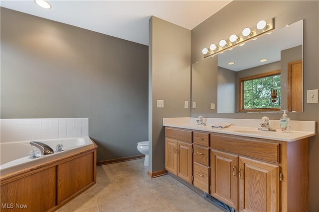 3342 Ramsgate St NW, North Canton, OH 44720 - full bathroom with double vanity, a garden tub, and tile patterned floors
