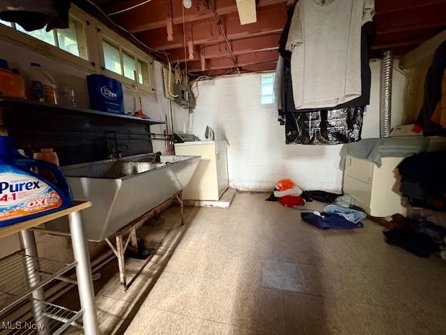 19510 Gardenview Dr, Maple Heights, OH 44137 - laundry room with independent washer and dryer and tile patterned floors