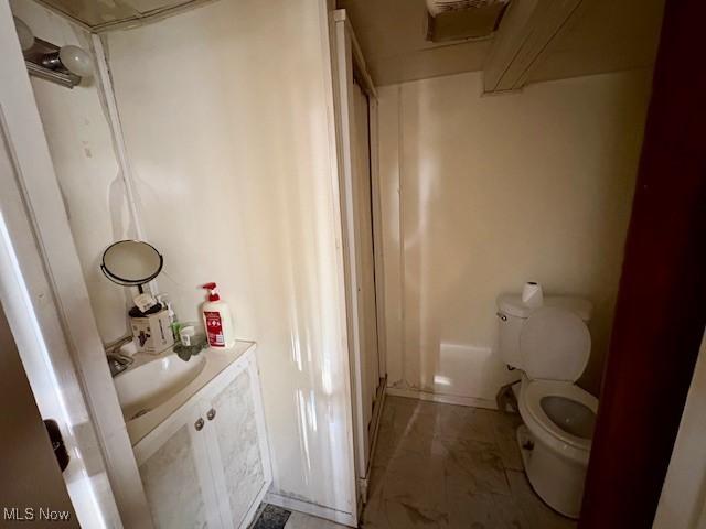19510 Gardenview Dr, Maple Heights, OH 44137 - bathroom with toilet and vanity