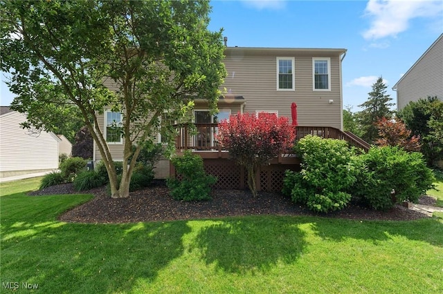 184 Creekledge Ln, Copley, OH 44321 - rear view of property featuring a lawn and a wooden deck