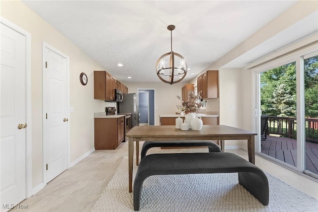 184 Creekledge Ln, Copley, OH 44321 - dining space featuring a chandelier, recessed lighting, and light tile patterned floors
