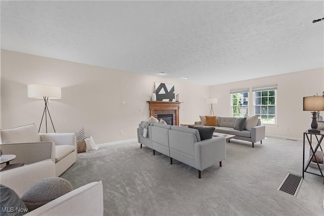 184 Creekledge Ln, Copley, OH 44321 - living area with carpet floors, a fireplace, and a textured ceiling