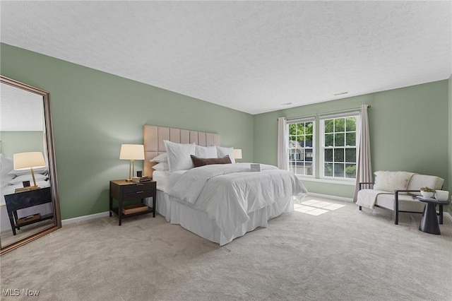184 Creekledge Ln, Copley, OH 44321 - carpeted bedroom featuring a textured ceiling and baseboards