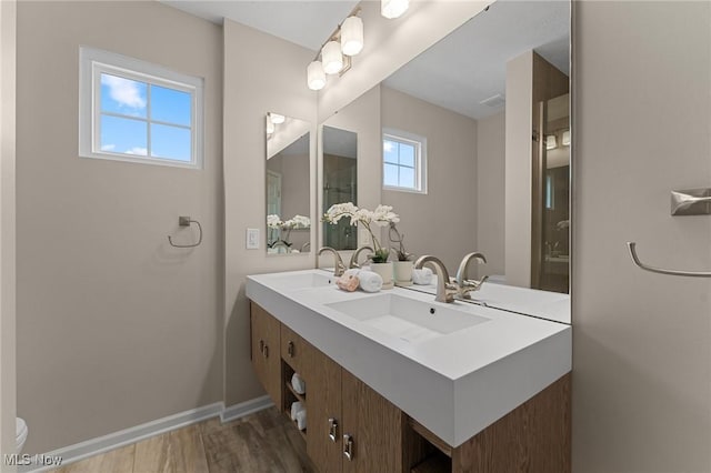 184 Creekledge Ln, Copley, OH 44321 - full bathroom with double vanity and wood finished floors