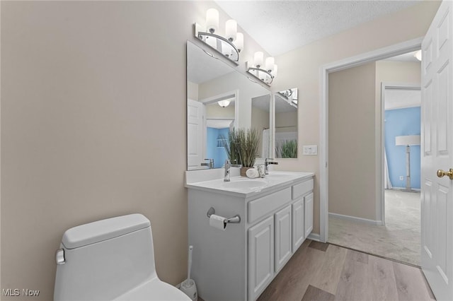 184 Creekledge Ln, Copley, OH 44321 - bathroom featuring wood finished floors and double vanity