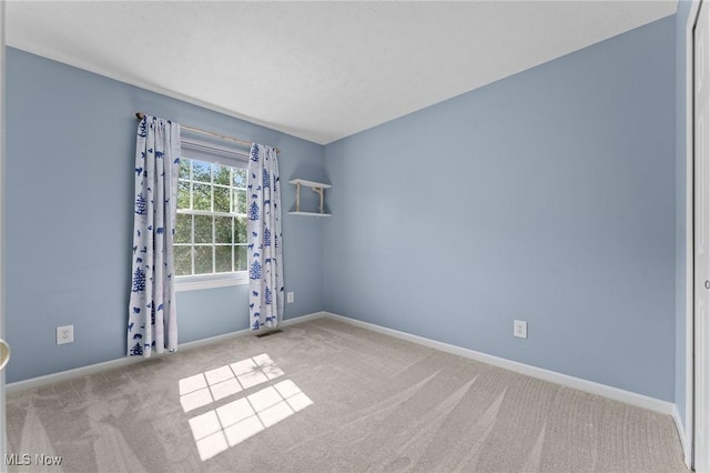 184 Creekledge Ln, Copley, OH 44321 - carpeted empty room with baseboards