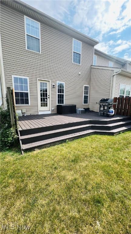116 Ledgestone Ct, Berea, OH 44017 - rear view of property featuring a wooden deck and a lawn