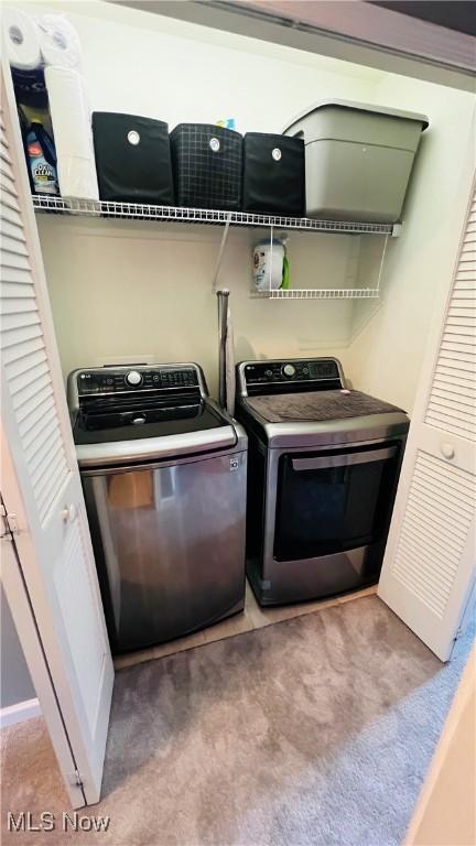 116 Ledgestone Ct, Berea, OH 44017 - laundry room with washer and clothes dryer and carpet floors
