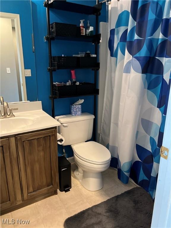 116 Ledgestone Ct, Berea, OH 44017 - full bathroom with vanity, tile patterned flooring, and a shower with curtain