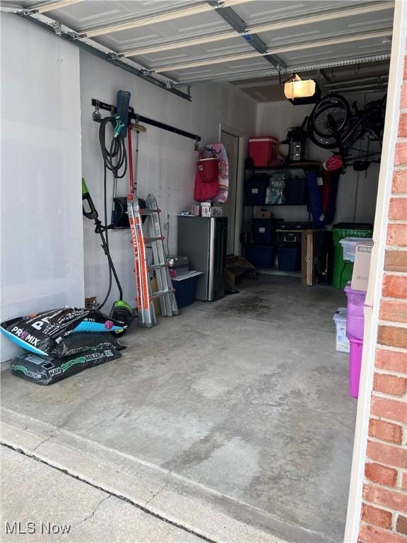 116 Ledgestone Ct, Berea, OH 44017 - garage featuring a garage door opener
