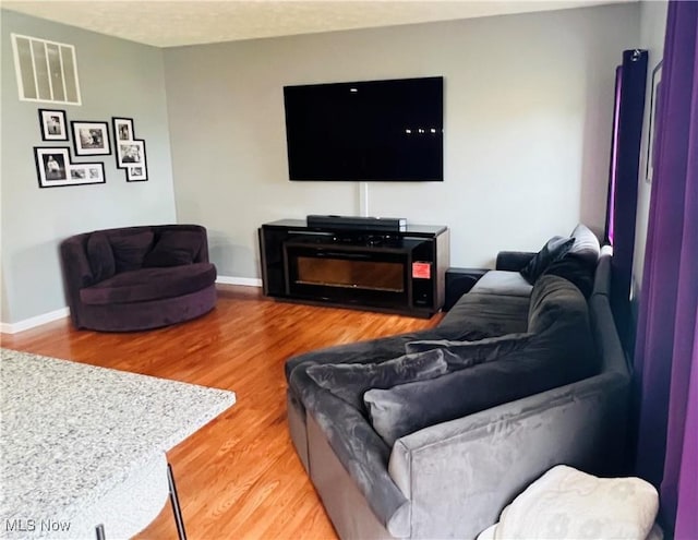116 Ledgestone Ct, Berea, OH 44017 - living room featuring wood finished floors and baseboards
