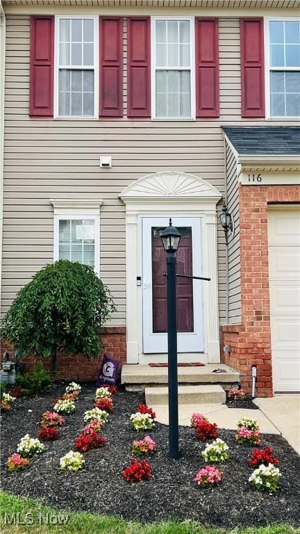 116 Ledgestone Ct, Berea, OH 44017 - doorway to property featuring a garage