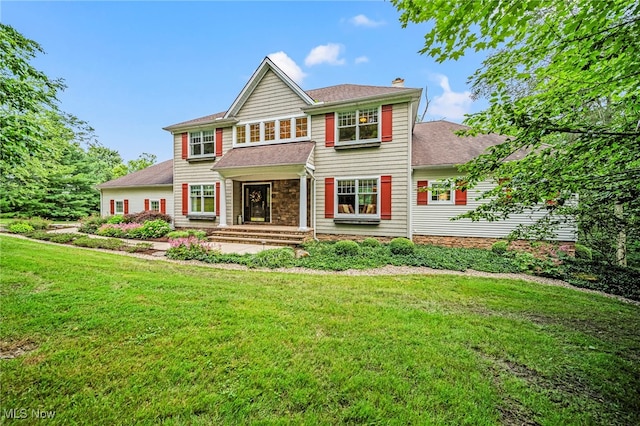 11275 Beechnut Ln, Chardon, OH 44024 - view of front facade with a chimney, a front lawn, and roof with shingles