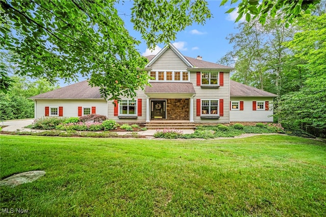 11275 Beechnut Ln, Chardon, OH 44024 - view of front of house with a front yard, a chimney, and roof with shingles