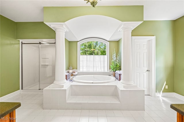 11275 Beechnut Ln, Chardon, OH 44024 - full bath featuring ornate columns, tile patterned flooring, vanity, and a garden tub