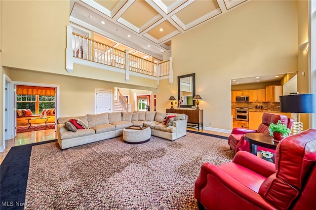 11275 Beechnut Ln, Chardon, OH 44024 - living room featuring a towering ceiling, coffered ceiling, recessed lighting, stairs, and beamed ceiling