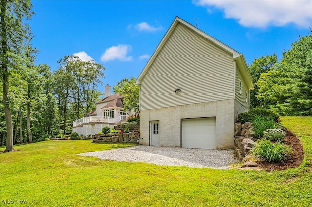 11275 Beechnut Ln, Chardon, OH 44024 - view of side of home featuring an attached garage and a lawn