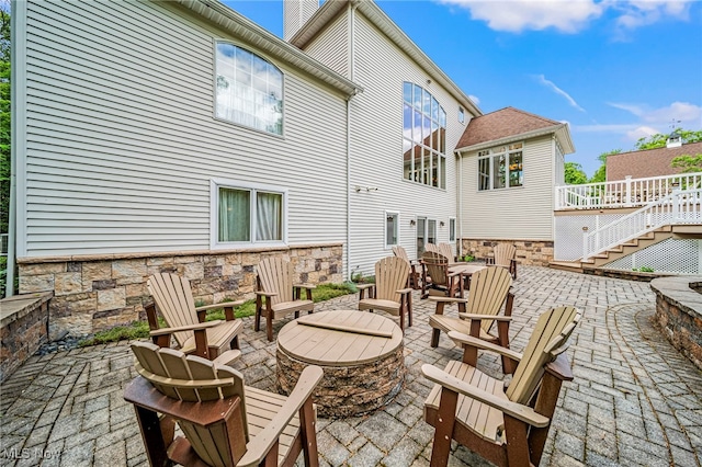 11275 Beechnut Ln, Chardon, OH 44024 - view of patio / terrace featuring a fire pit and stairway