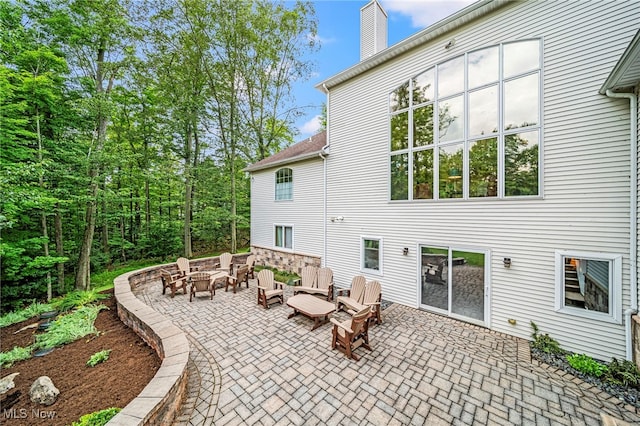11275 Beechnut Ln, Chardon, OH 44024 - view of patio with a fire pit