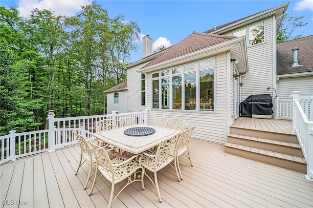 11275 Beechnut Ln, Chardon, OH 44024 - wooden deck featuring outdoor dining area and area for grilling