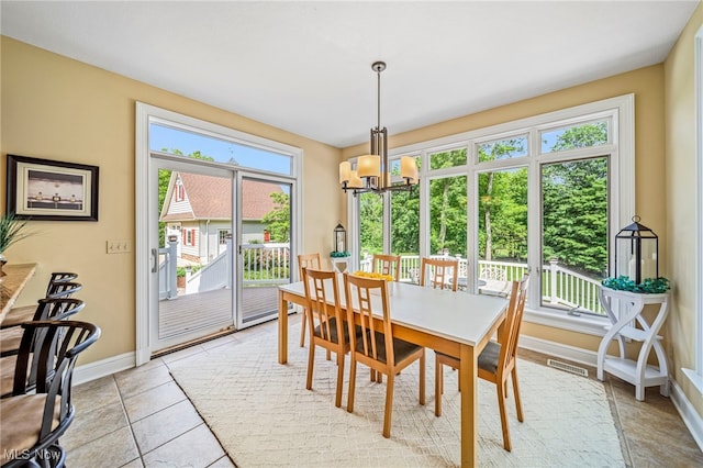 11275 Beechnut Ln, Chardon, OH 44024 - dining room featuring a chandelier and light tile patterned floors