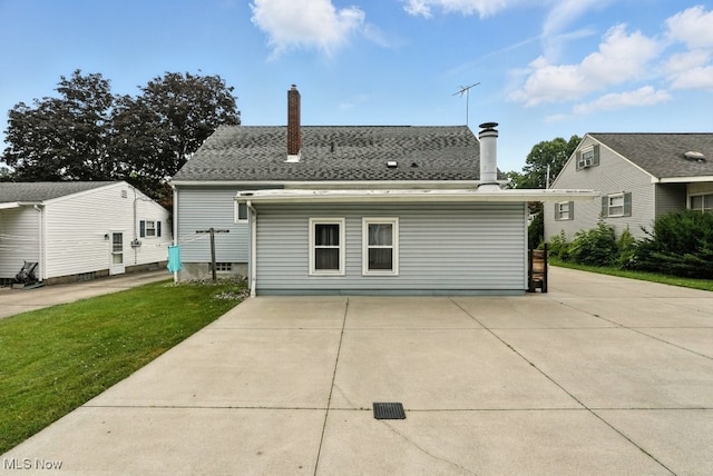3692 Orchard St, Mogadore, OH 44260 - back of property with a chimney and a yard