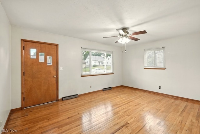 3692 Orchard St, Mogadore, OH 44260 - foyer entrance featuring light wood-style floors and ceiling fan