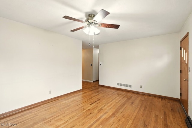 3692 Orchard St, Mogadore, OH 44260 - spare room featuring light wood-type flooring and a ceiling fan