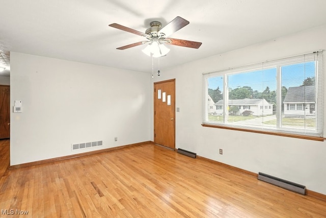 3692 Orchard St, Mogadore, OH 44260 - spare room with light wood-style flooring and a ceiling fan