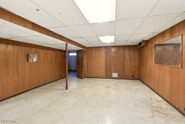 3692 Orchard St, Mogadore, OH 44260 - finished basement featuring a drop ceiling, light floors, and wood walls