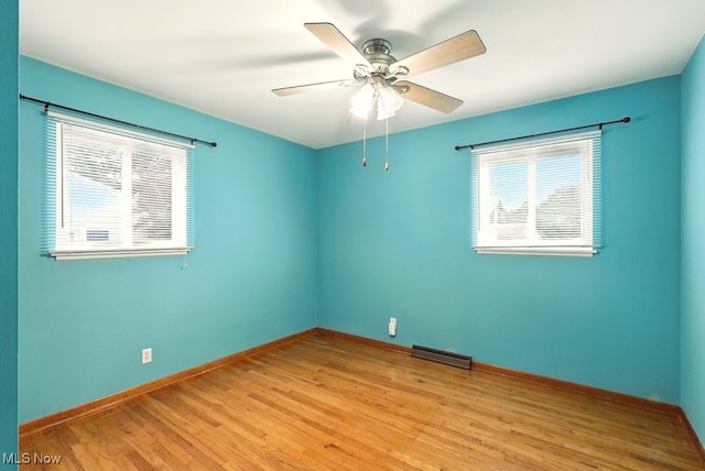 3692 Orchard St, Mogadore, OH 44260 - unfurnished room featuring light wood finished floors and ceiling fan