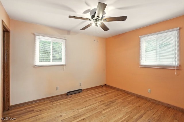 3692 Orchard St, Mogadore, OH 44260 - empty room with light wood-style floors and a ceiling fan