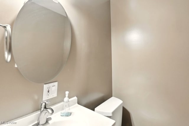 3692 Orchard St, Mogadore, OH 44260 - half bathroom featuring toilet and vanity