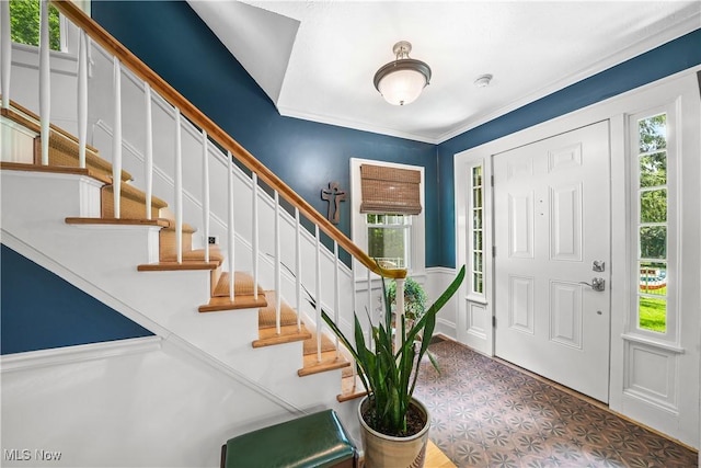 6735 Wakefield Rd, Hiram, OH 44234 - foyer featuring healthy amount of natural light, stairway, and a decorative wall