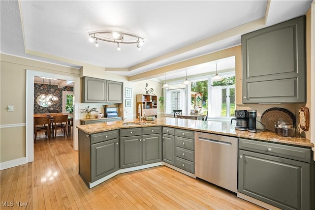 6735 Wakefield Rd, Hiram, OH 44234 - kitchen featuring stainless steel dishwasher, gray cabinetry, light wood-type flooring, and light stone countertops