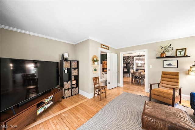 6735 Wakefield Rd, Hiram, OH 44234 - living area featuring hardwood / wood-style flooring, crown molding, and a chandelier