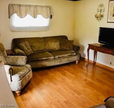 134 E Summit St, Alliance, OH 44601 - living room with wood finished floors
