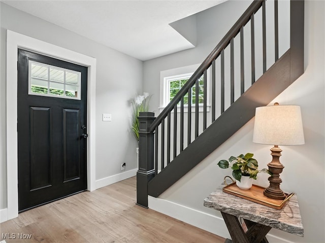 4930 S Ridge Rd W, Ashtabula, OH 44004 - foyer entrance with wood finished floors and stairway