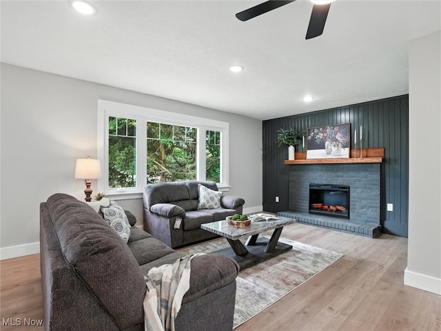 4930 S Ridge Rd W, Ashtabula, OH 44004 - living area with a fireplace, recessed lighting, wood finished floors, and ceiling fan