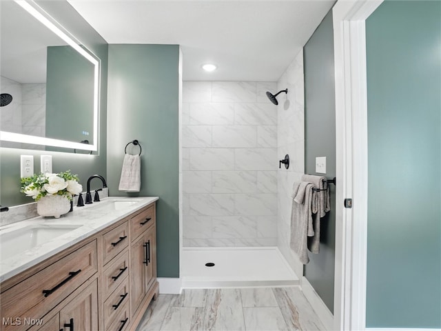 4930 S Ridge Rd W, Ashtabula, OH 44004 - full bath featuring marble finish flooring, double vanity, a tile shower, and recessed lighting