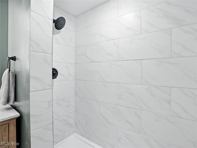 4930 S Ridge Rd W, Ashtabula, OH 44004 - bathroom featuring a tile shower and vanity