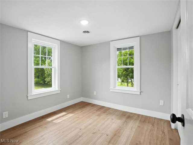 4930 S Ridge Rd W, Ashtabula, OH 44004 - unfurnished room with light wood-type flooring and plenty of natural light