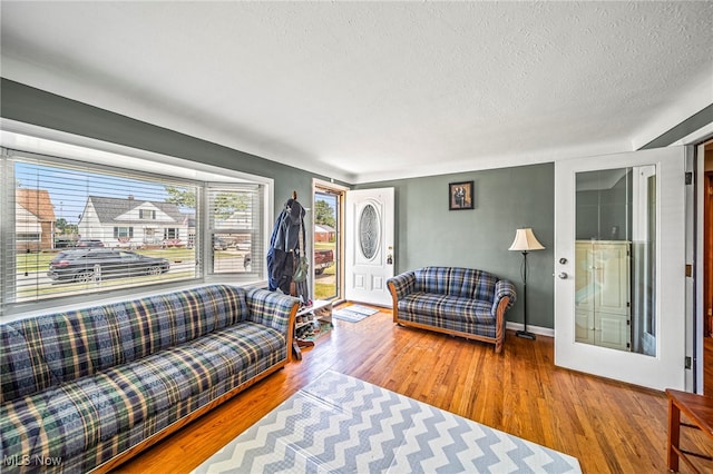 1743 Silver St, Wickliffe, OH 44092 - living area with a textured ceiling and wood finished floors