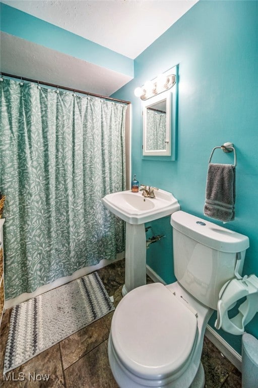 1743 Silver St, Wickliffe, OH 44092 - bathroom featuring toilet and baseboards